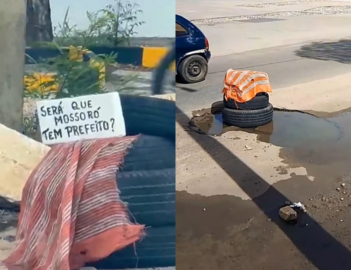 Moradores sinalizam buraco com pneus e cartaz em Mossoró